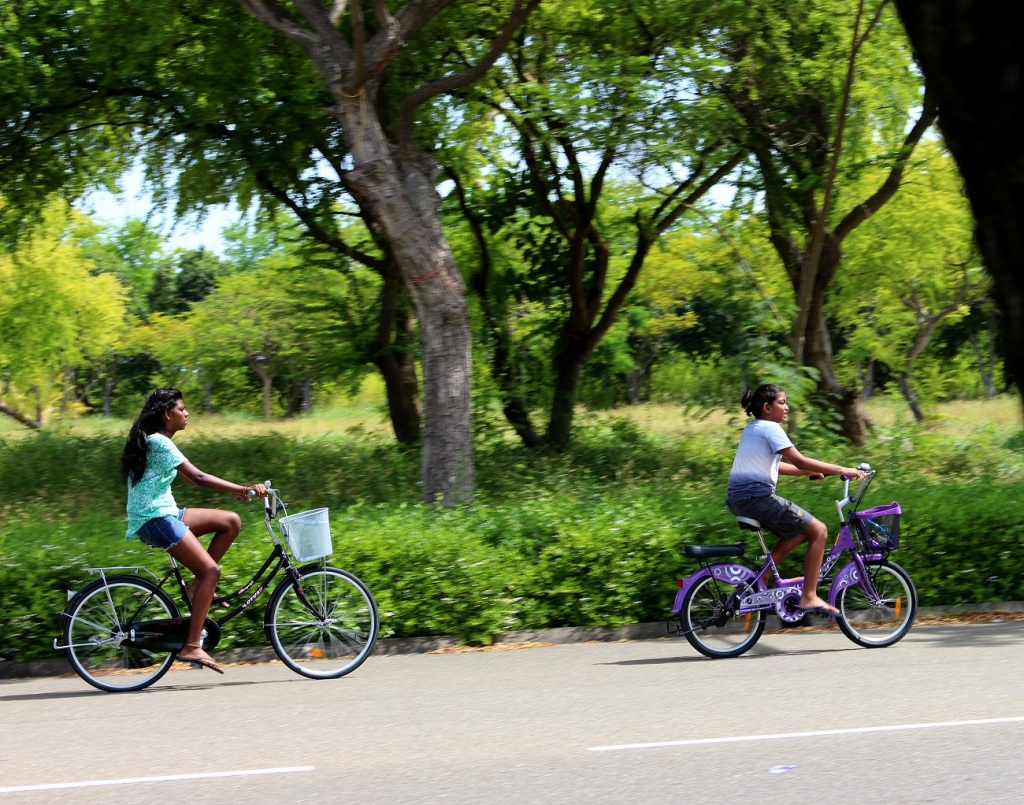 two girls on bicycles resized