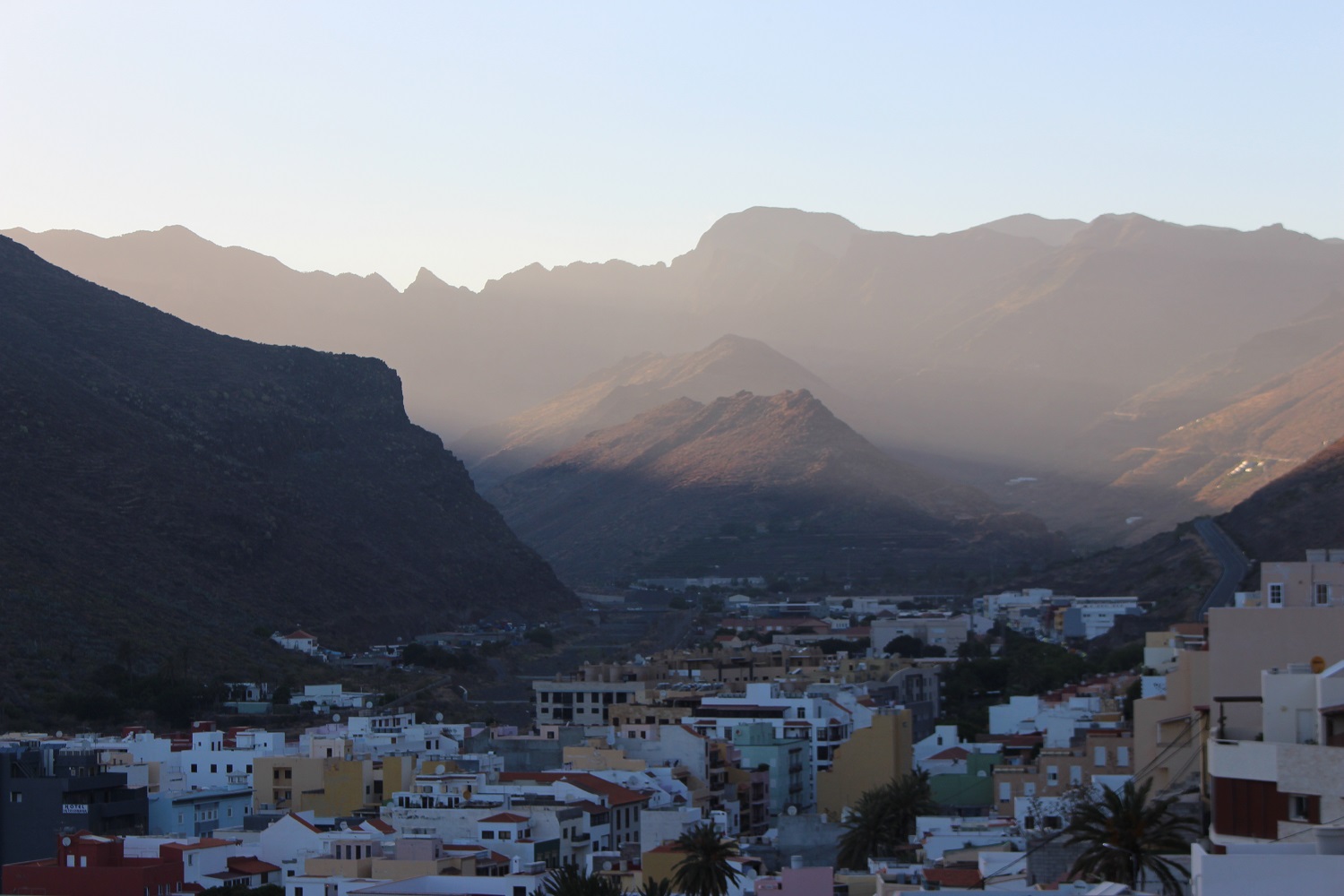 misty-sunset-over-town